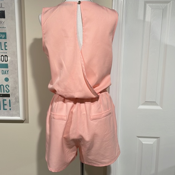 Peach shorts romper with cute features. - Picture 5 of 9